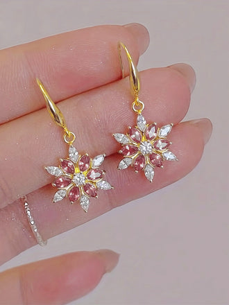 Boucles d’Oreilles Pendantes Dorées Flocon de Neige pour Noël - 1