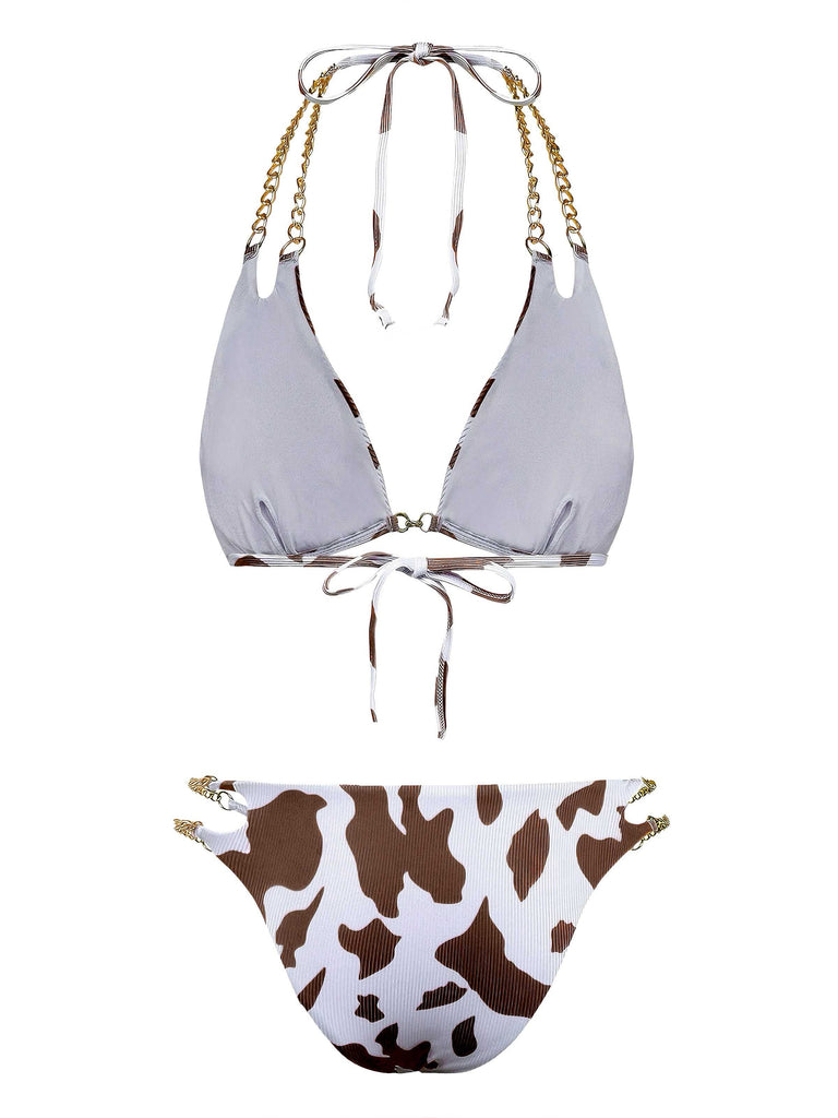 Back view of the brown and white cow print bikini with gold chain accents.