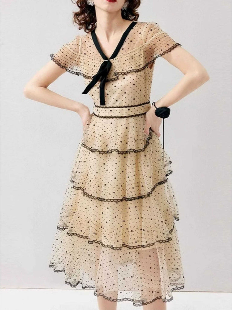 Robe ourlet superposé à volants en maille à pois et nœud années 1950