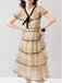 Robe ourlet superposé à volants en maille à pois et nœud années 1950