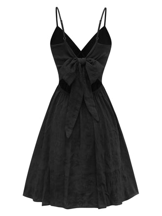 Robe noire bohème à fleurs brodées et nœud années 1970