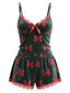 Ensemble de pyjama vert motif nœuds velours sur le thème de Noël années 1950