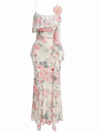 Front studio view of the floral maxi dress highlighting the elegant ruffled overlay and slim-fit silhouette.