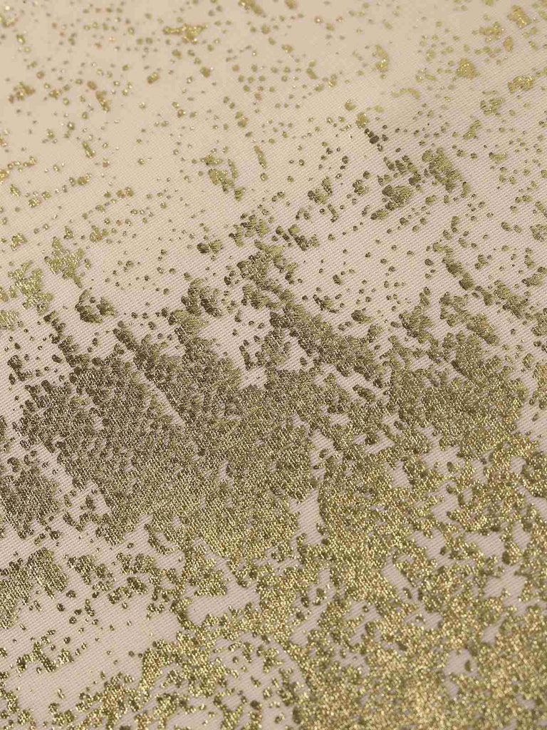 Textured fabric with a pattern of gold and beige colors