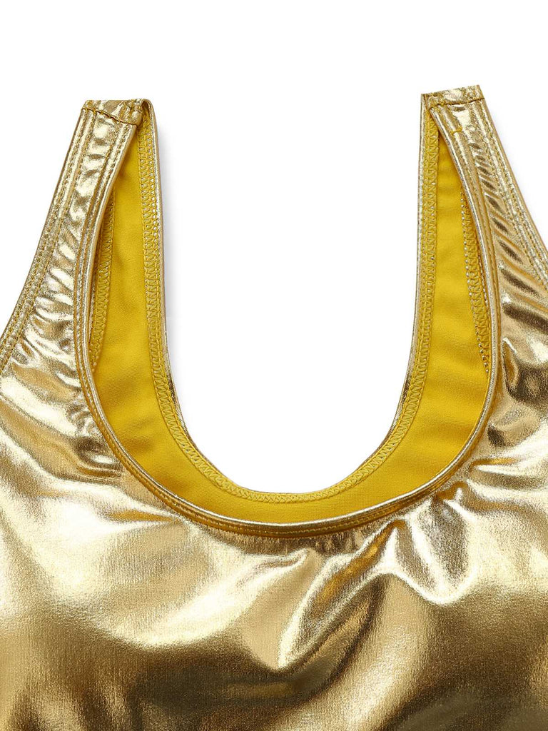 Close-up of the scoop neckline and inner yellow lining of the metallic gold bikini top.