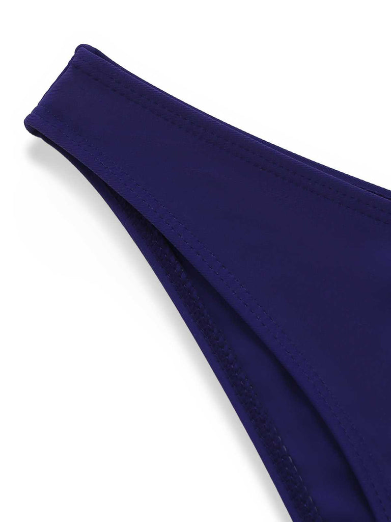 Close-up of the wide halter neck straps that tie securely at the back of the neck.