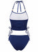 Rear view of the swimsuit set highlighting the high-back coverage of the bottoms and the halter neck tie.