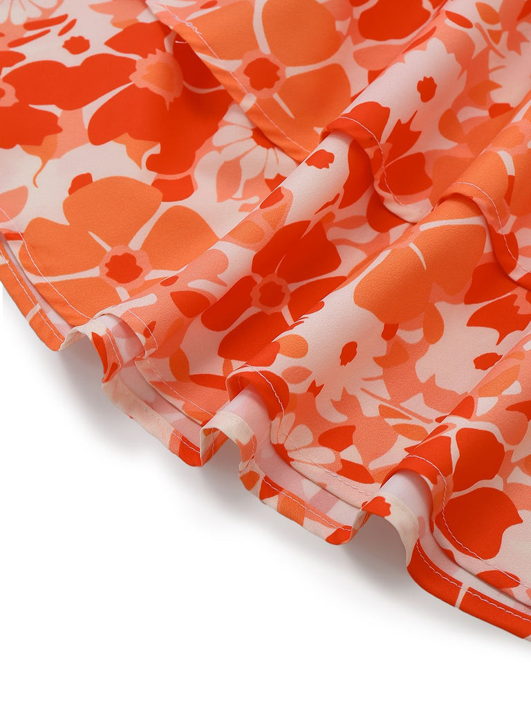 Close-up of orange and white floral fabric on a white background