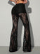 Pantalon long évasé noir en dentelle transparente à taille haute années 1970 - 2