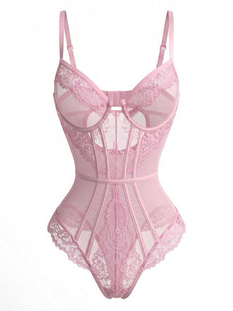 Front studio shot of the pink lace bodysuit highlighting the intricate floral embroidery and cut-out details at the bust.