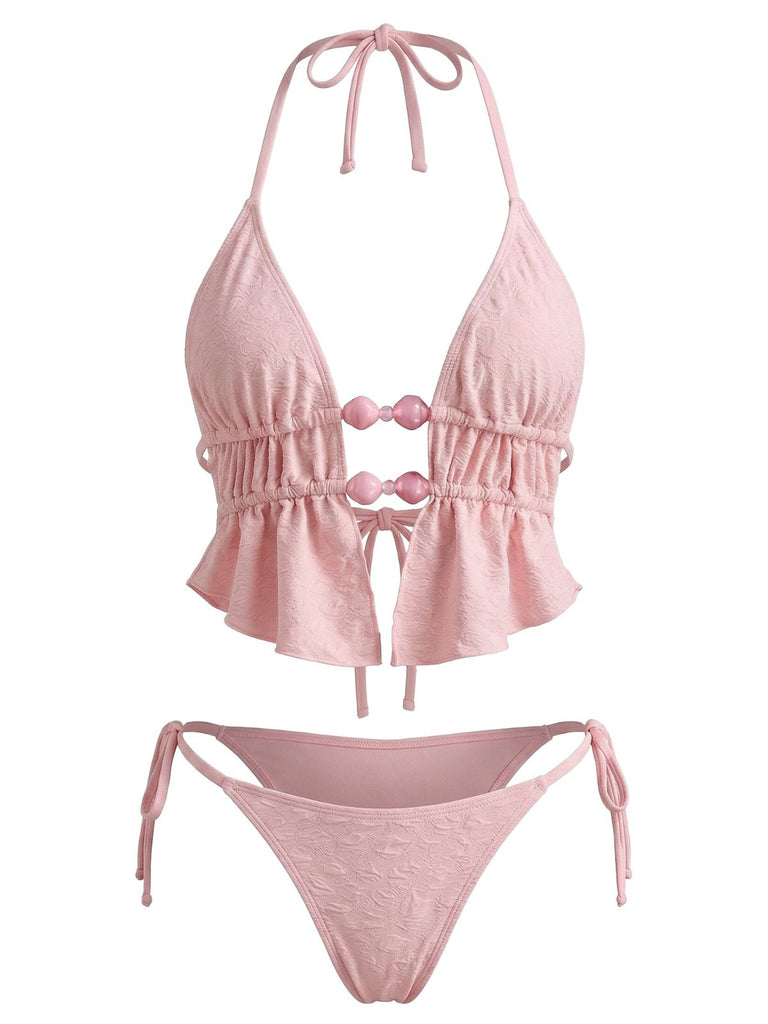 Front view of the ruffled pink bikini set with halter and side ties.