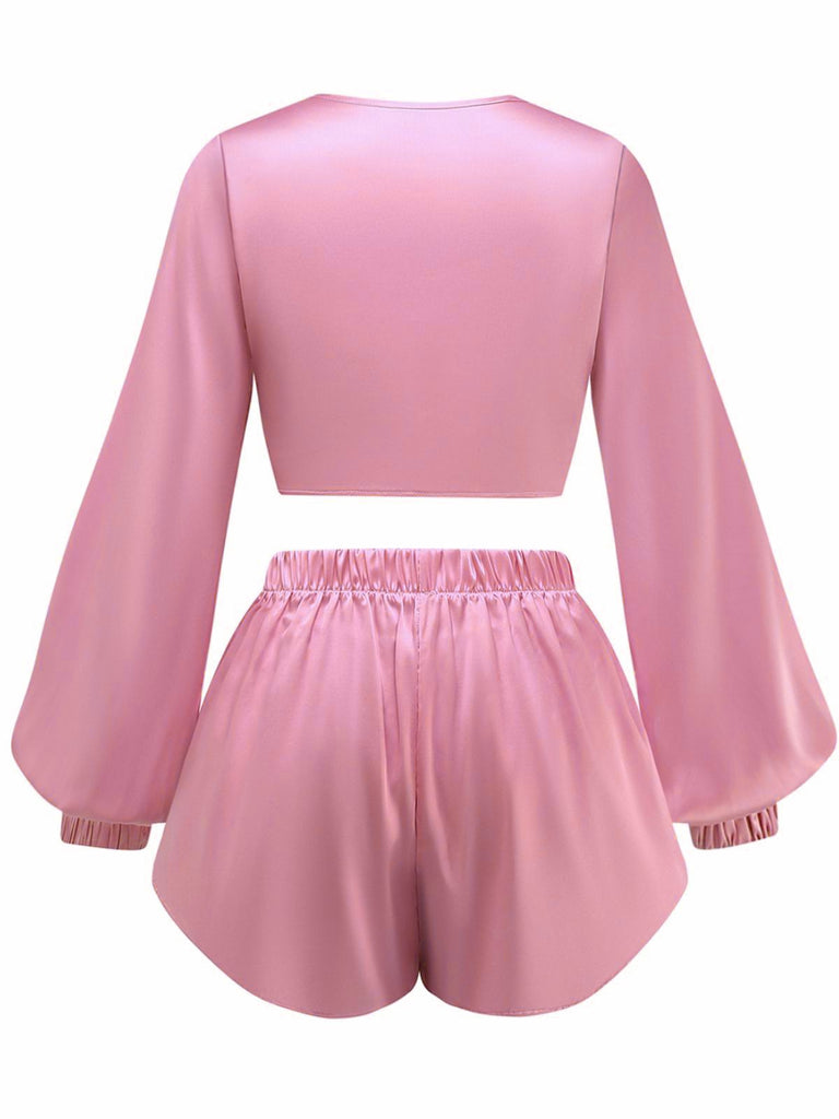 the silky satin tie-front set in a soft dusty pink color.
