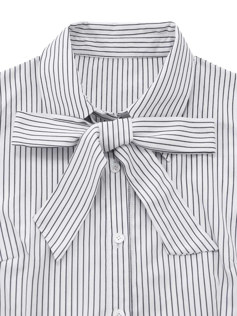 Close-up of the collar and the neatly tied pinstripe fabric bow.