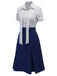 Three-quarter view of the blouse and skirt ensemble showcasing the flared hemline.