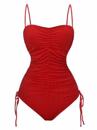 Red swimsuit with thin straps on a white background