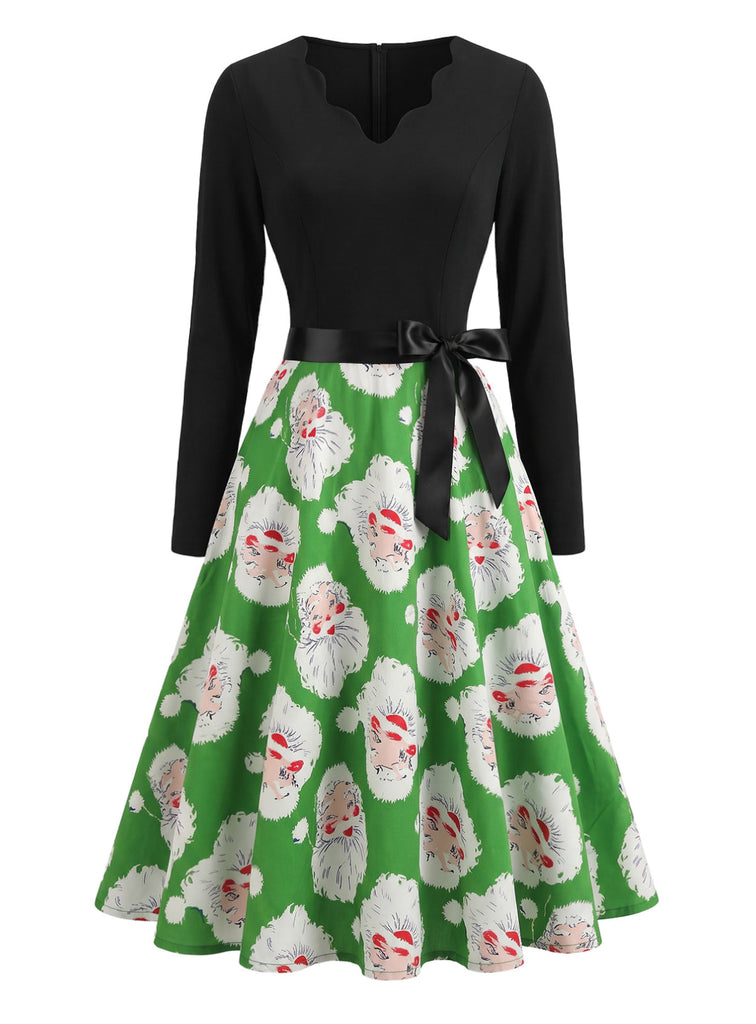 Robe verte de Noël à motif Père Noël et col V festonné Années 1950 - 2