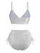 Back view of the silver shimmering bikini set, showcasing the metallic finish and high-waist fit.