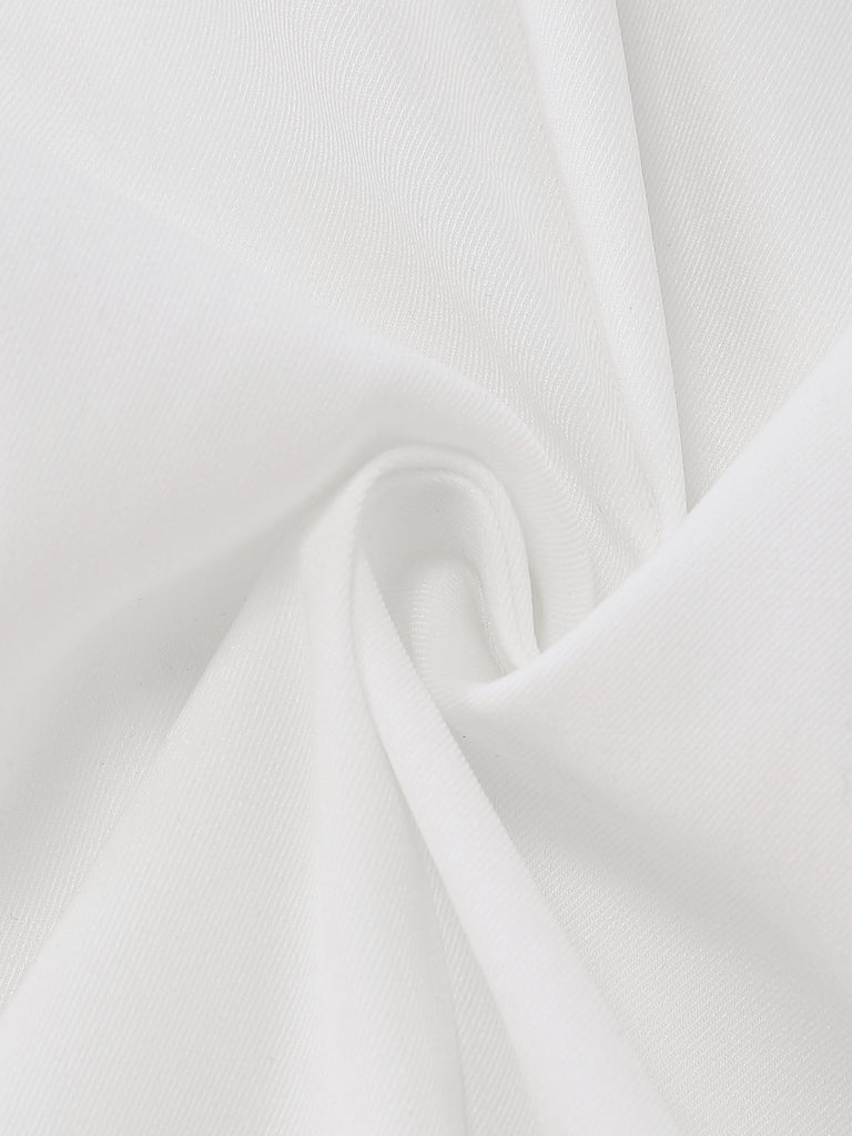 Close-up of the high-quality smooth white fabric used for the tailored blazer dress.