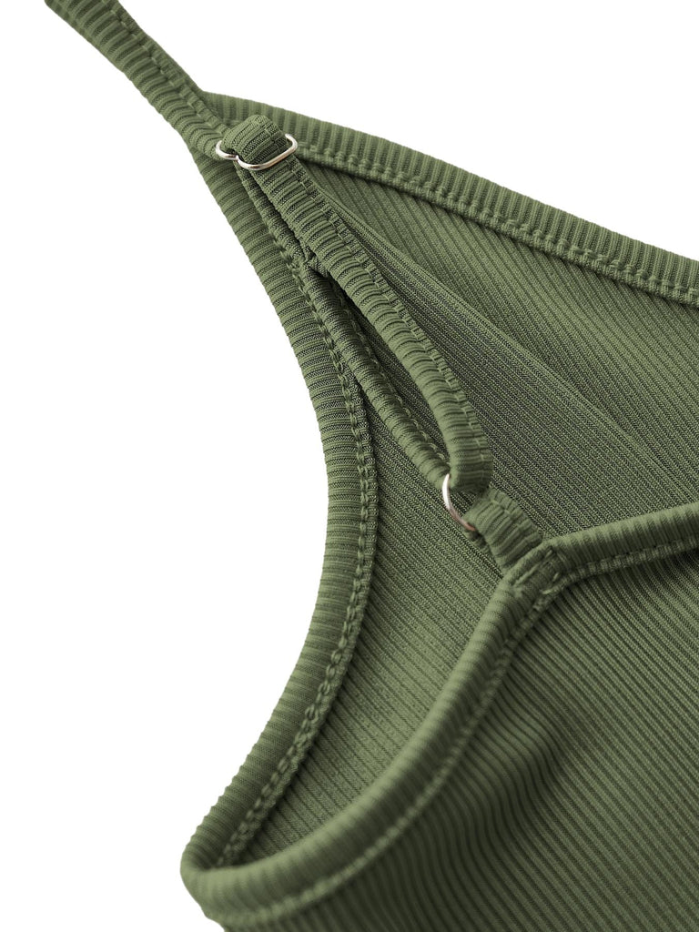 Detailed shot of the adjustable spaghetti straps and gathered neckline on the cami jumpsuit.
