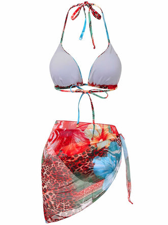back view of the bikini set showing the white-lined triangle cups and the sheer matching side-tie sarong.