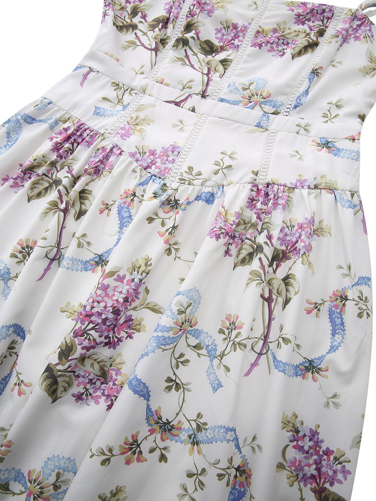 Detailed view of the fitted waistline and structured bodice seams featuring the blue ribbon and flower motif.