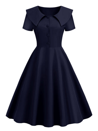 Robe trapÚze à revers uni des années 1950