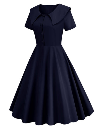 Robe trapÚze à revers uni des années 1950