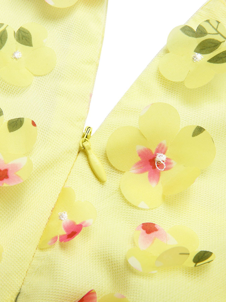 Robe trapèze jaune à fleurs 3D et manches bouffantes