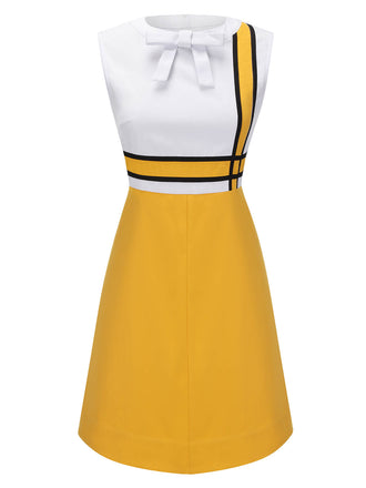 Robe blanche et jaune patchwork nĆud papillon des annĂ©es 1960