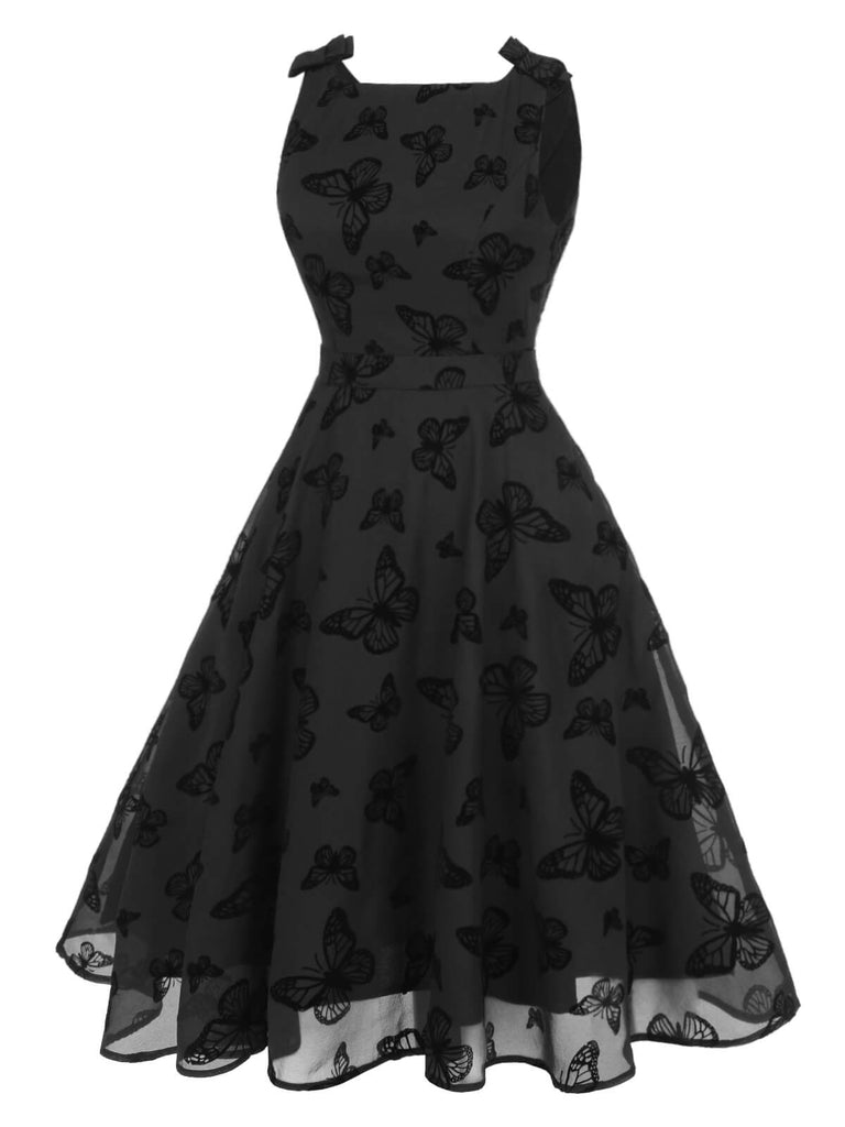 Robe Noire en maille floquée papillon des années 1950