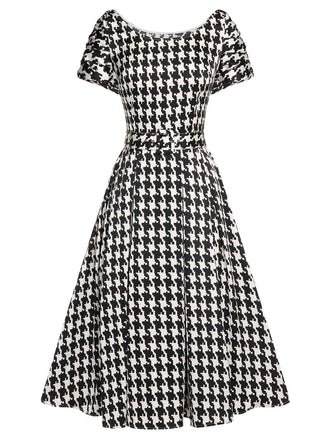 Robe noire ceinturée à manches courtes et pied-de-poule des années 1950