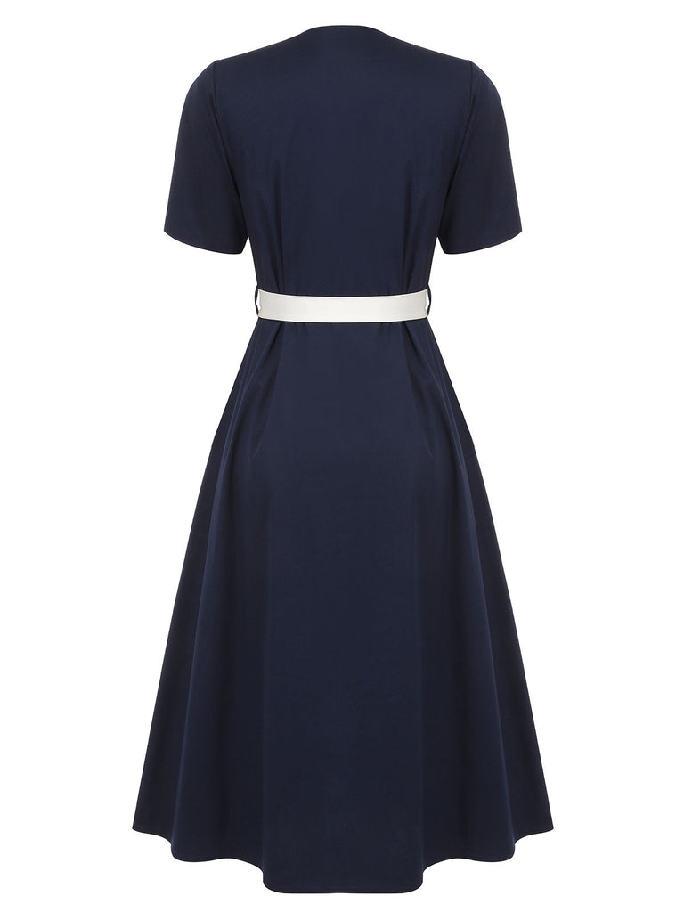 Robe col marin bleu foncé et blanc des années 1940