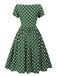 Robe patchwork verte à pois et nœud papillon des années 1940