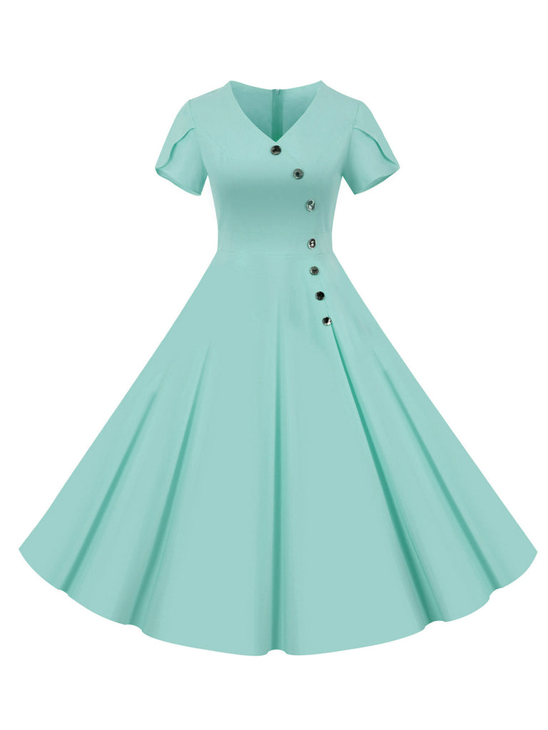 Robe unie à simple boutonnage et col en V des années 1950