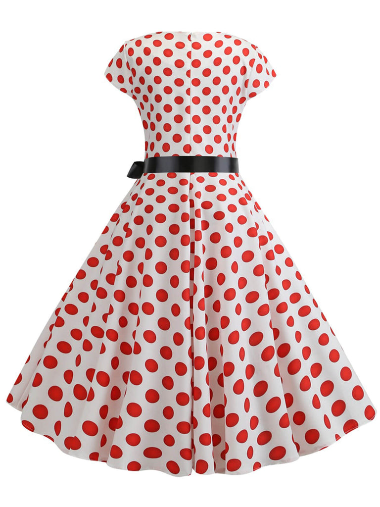 Robe à manches cape à pois des années 1950