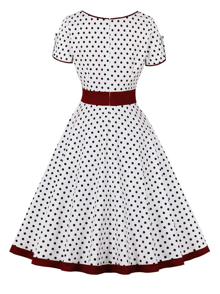 Robe boutonnée à pois contrastés des années 1950