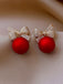 Boucles d'oreilles diamant nœud de Noël rouge