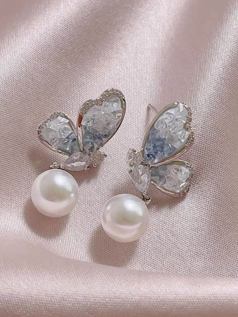 Boucles d'oreilles en perles papillon en cristal bleu clair