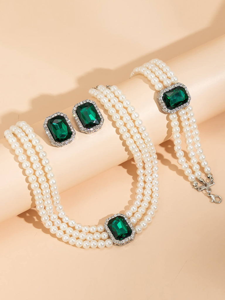 Ensemble collier bracelet et boucles d'oreilles en perles de pierres précieuses