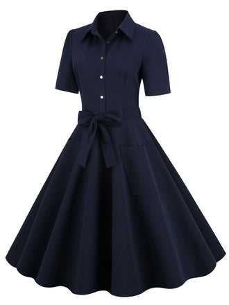 Robe trapÚze bleu marine à lacets et revers des années 1950 Cocktail Chic