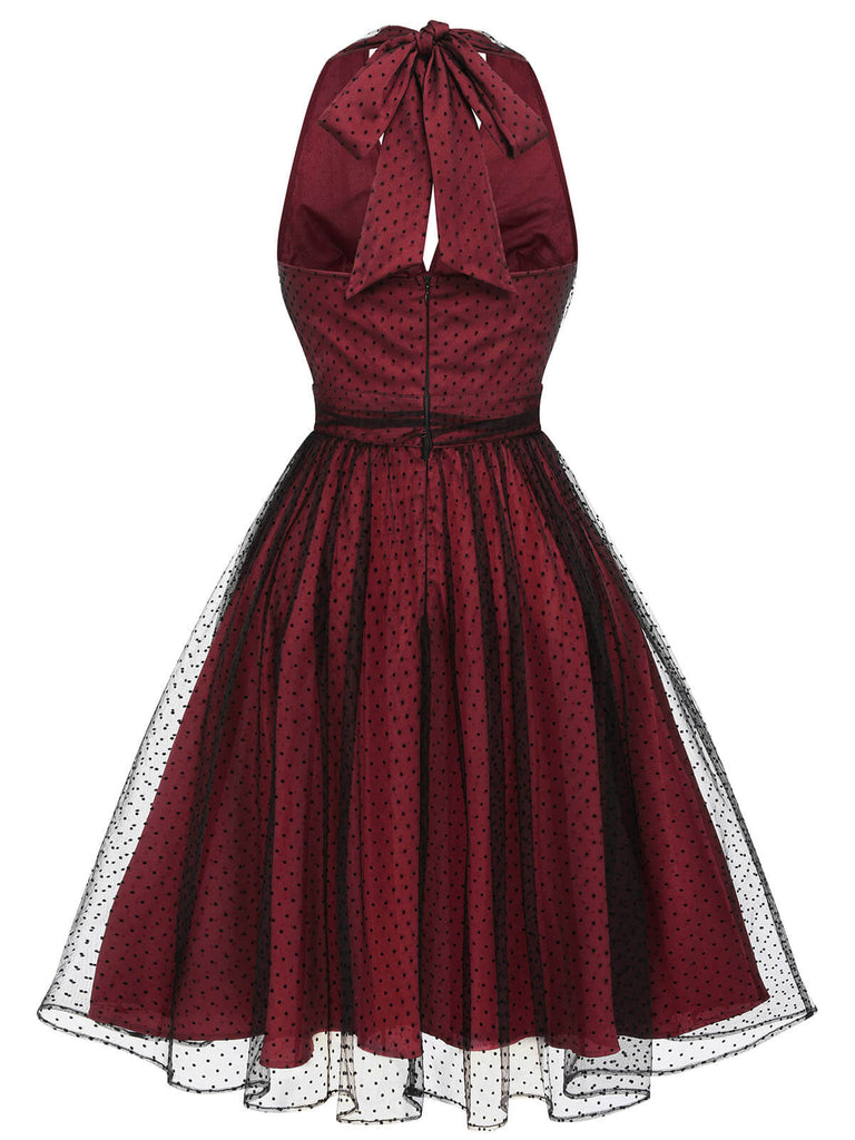 Robe trapèze rouge années 50 en maille à pois cocktail chic