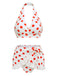 Ensemble bikini et tablier rétro à pois