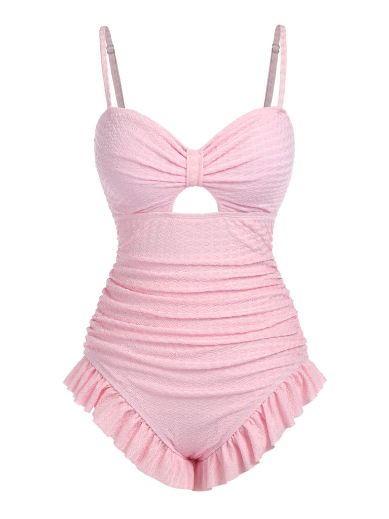 Maillot de bain froncé uni rose pâle des années 1950