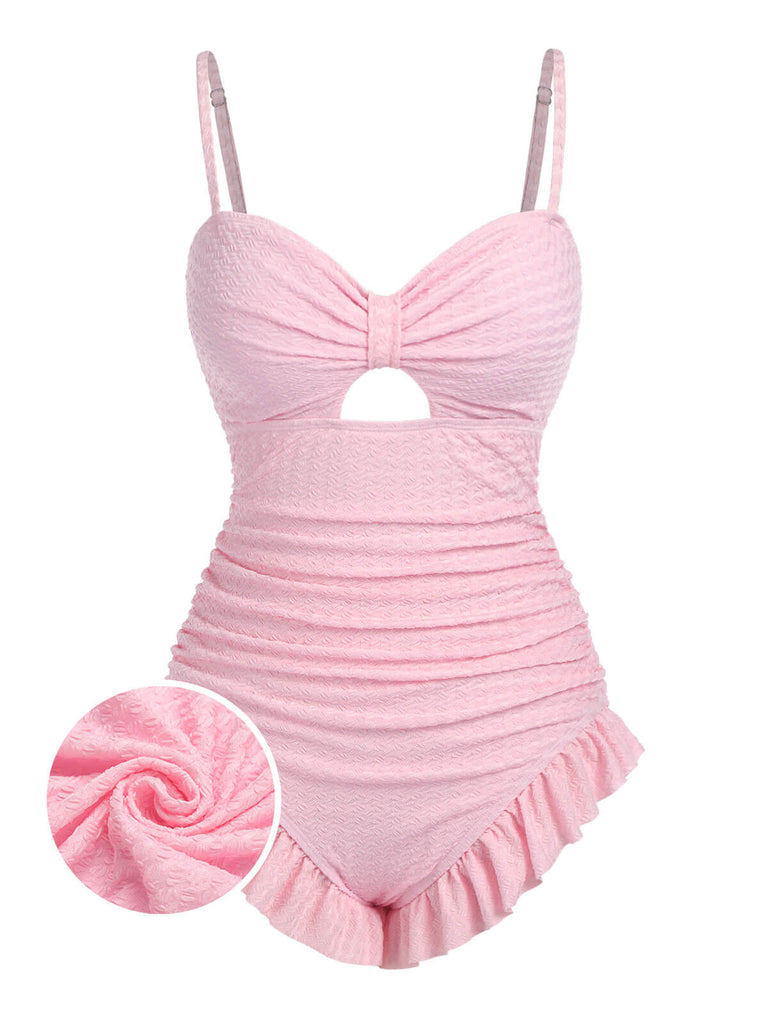 Maillot de bain froncé uni rose pâle des années 1950